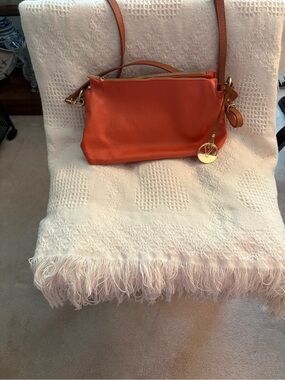 Valentino Garavani Vibrant Orange Leather Crossbody with Gold Charm